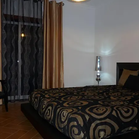 Rum i privatbostad Quartos Deco *